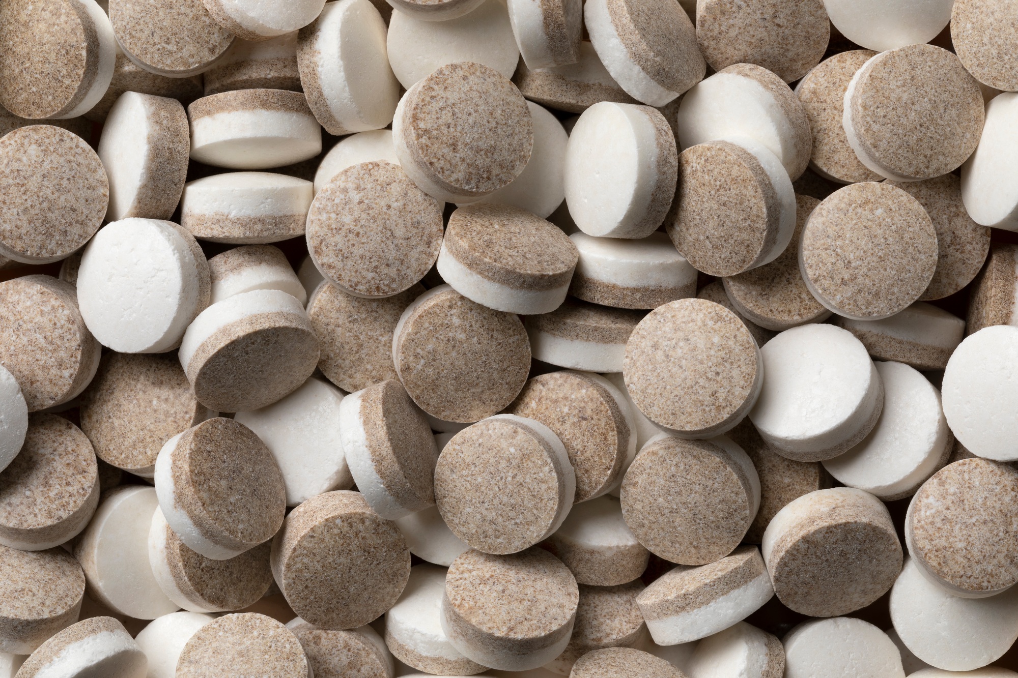 Dutch black and white liquorice pastilles close up full frame