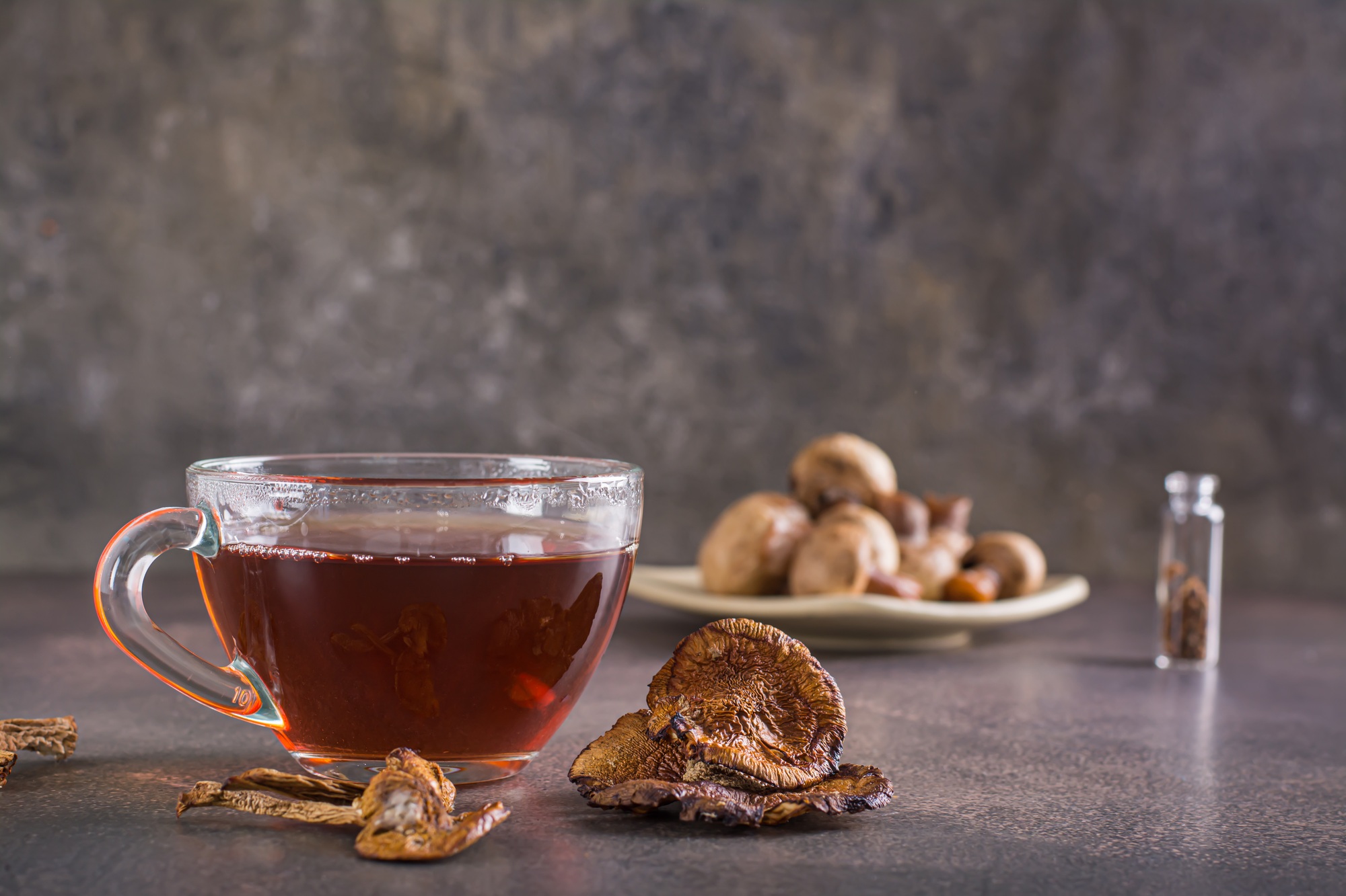 Organic mushroom tea in a cup for alternative herbal medicine
